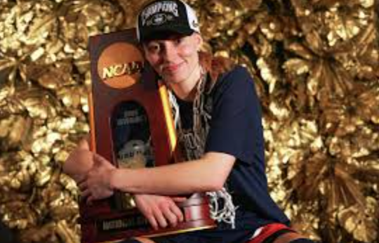 Bueckers posing for a championship photo after win over South Carolina. C. Morgan Engel/NCAA Photos